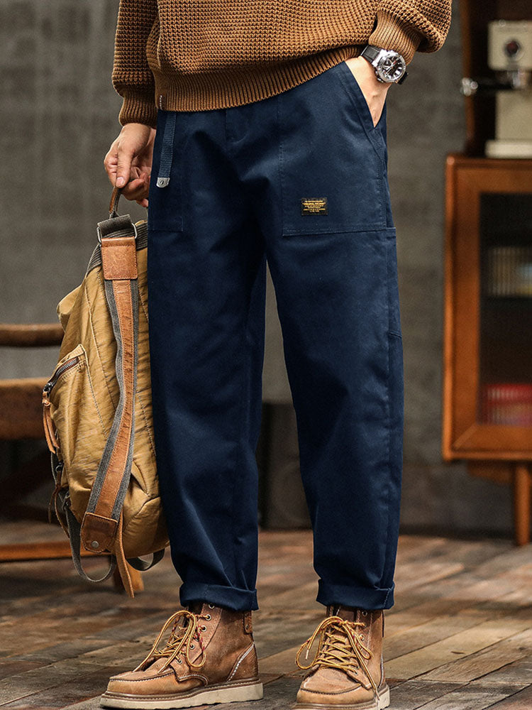 Men's black vintage utility pants with multi-pockets, durable for outdoor & casual wear.
