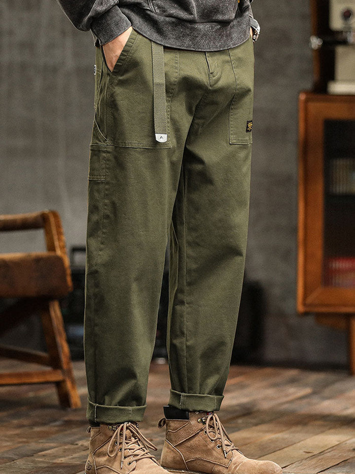 Workwear inspired men's vintage utility pants, classic design for everyday casual look.