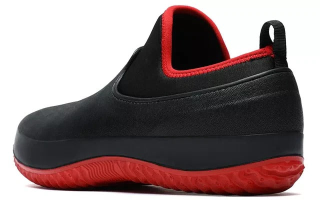 Men's black & blue waterproof slip-on work shoes. Durable non-slip safety footwear, ideal for outdoor work comfort.