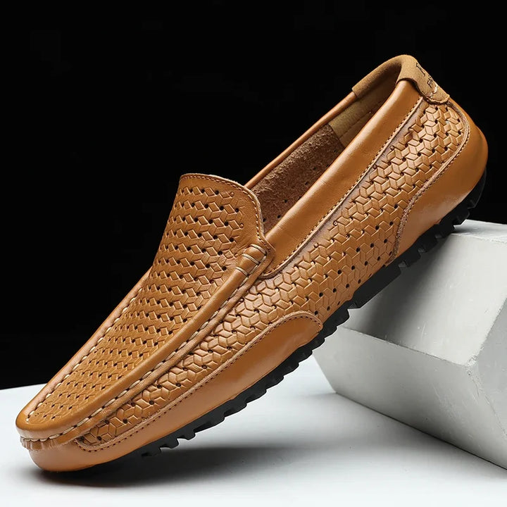 Men's black woven comfort loafers, side view, showing breathable design and lightweight construction.