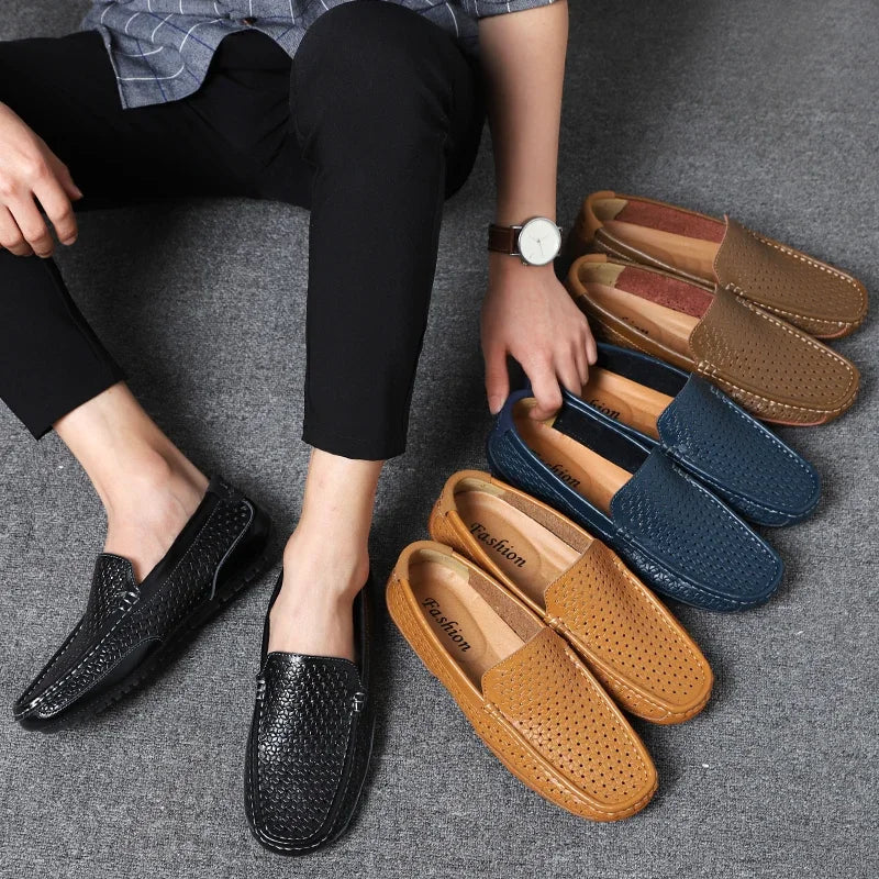 Men's grey casual slip-on loafers, angled view, featuring a durable traction sole for comfort.