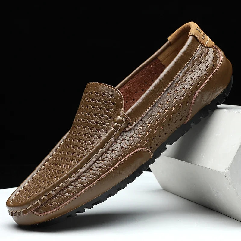 Model wearing men's blue woven comfort loafers, demonstrating smart casual style and lightweight feel.
