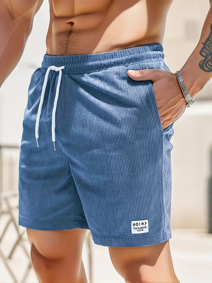 Casual quick-dry swim shorts for men, ideal beachwear & pool shorts for summer.
