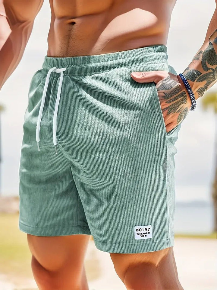 Men's summer swim shorts with elastic waist, quick-dry and stylish for any activity.