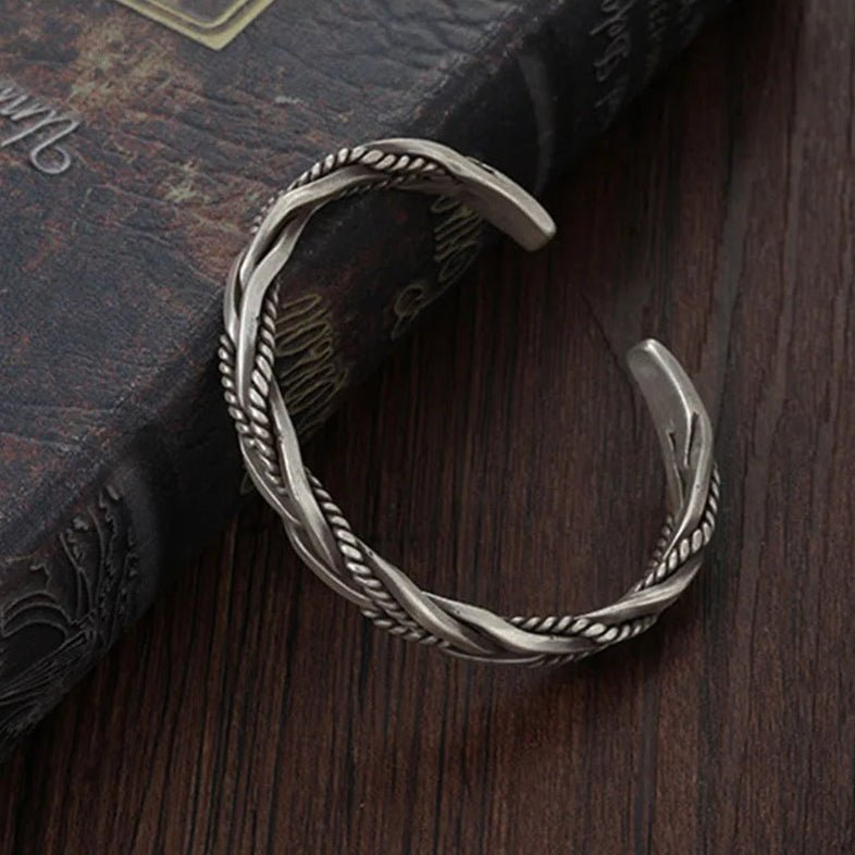 Versatile men's sterling silver braided open cuff bracelet. A classic and durable piece of men's fashion.