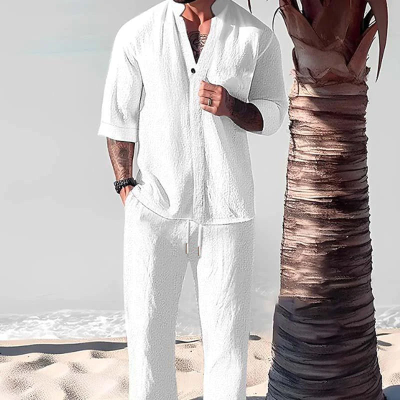 Relaxed fit men's two-piece cotton-linen lounge set with a button-down shirt & drawstring pants.