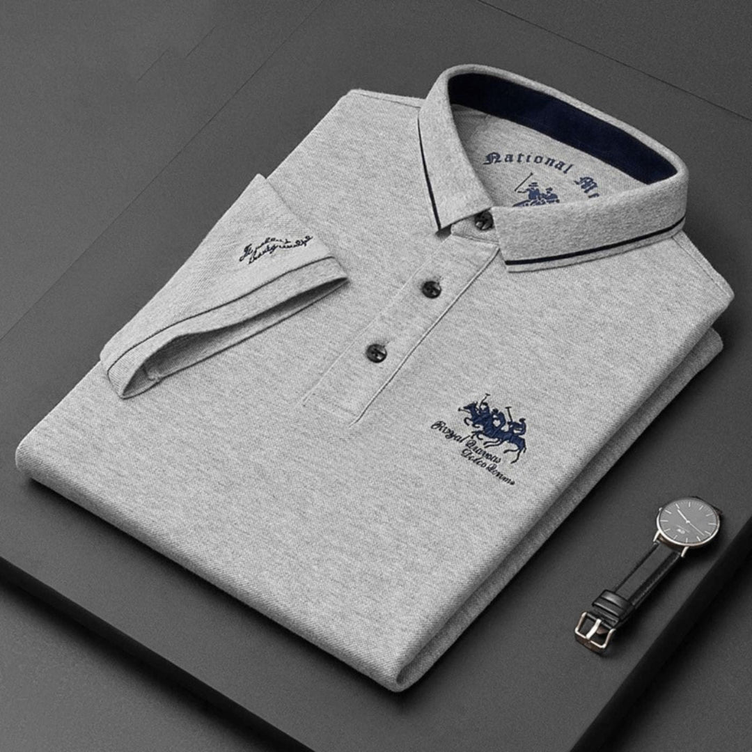 Casual men's fashion polo, embroidered detail, breathable fabric, perfect for summer.