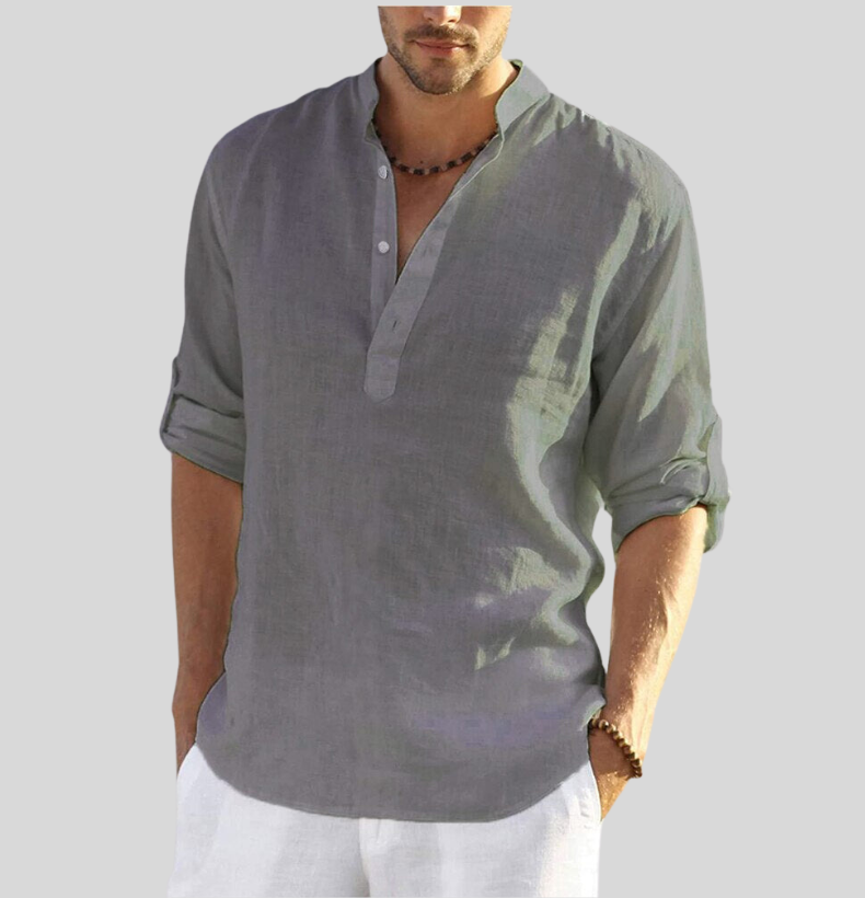 Model wearing a comfortable, breathable men's long sleeve Henley shirt, suitable for casual summer activities.