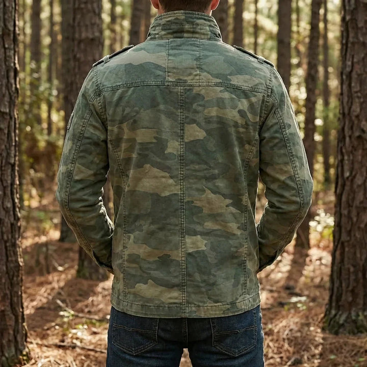 Close-up of men's rugged camouflage jacket, showcasing military style fabric & utility pockets.