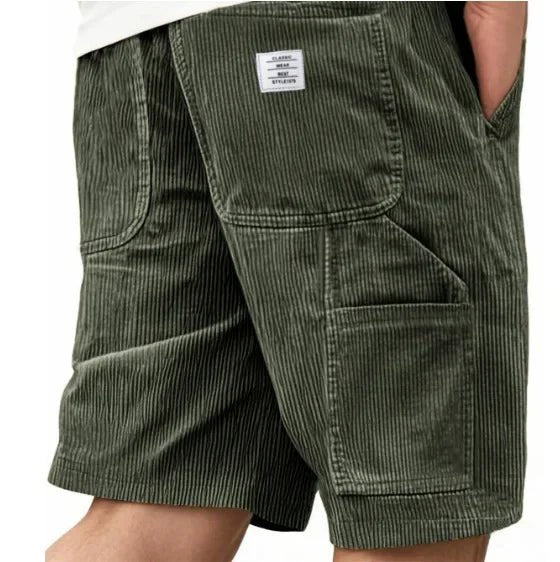 Relaxed fit men's cargo shorts with ample storage pockets. Ideal for outdoor adventures & travel.