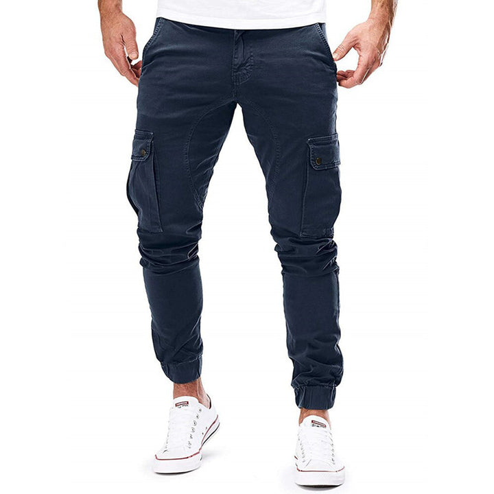A man wearing men's casual cargo trousers, highlighting the comfortable fit and functional design.