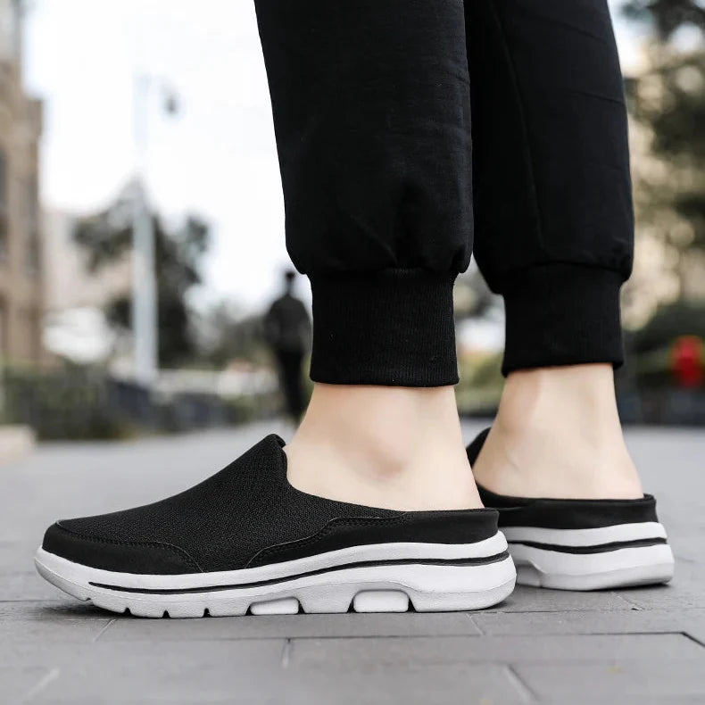 Textured men's casual closed-toe mule sandals, designed for easy slip-on comfort and everyday wear.