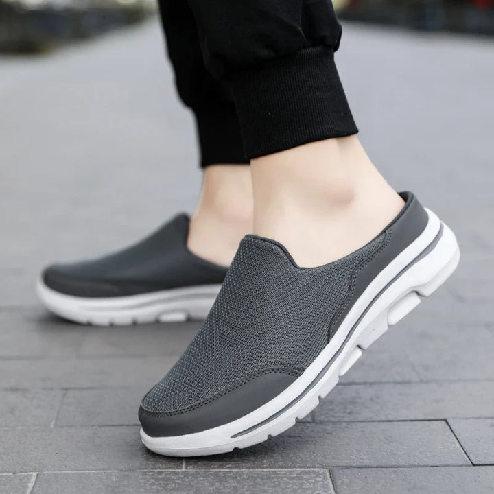 Men's casual slip-on mule sandals, closed-toe design offering comfort and versatility for summer footwear.
