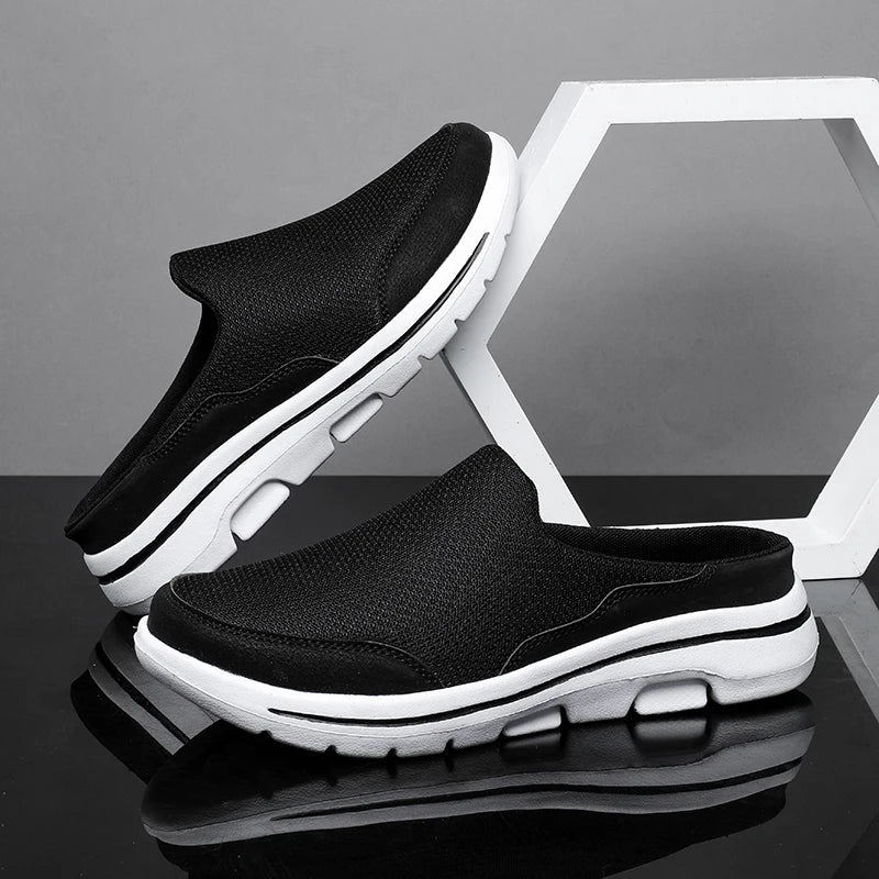 Stylish textured men's closed-toe mule sandals, a comfortable slip-on choice for casual summer outings.