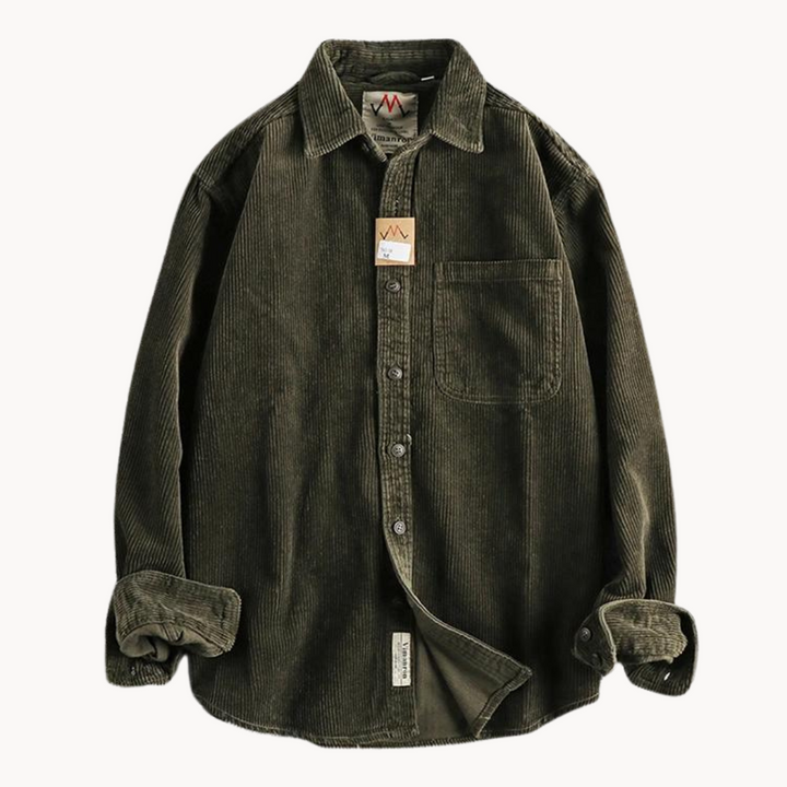 Flat lay of a men's corduroy button-down shirt, displaying its fall and winter fashion appeal