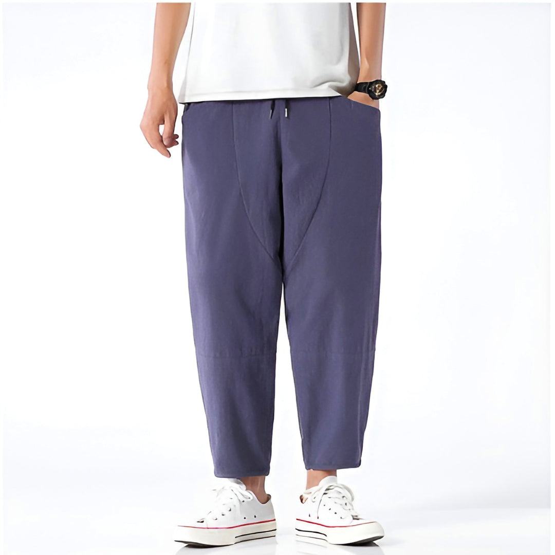 Stylish men's chino pants, cropped with drawstring waist for a modern, relaxed look.