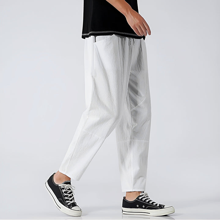 Versatile men's cropped drawstring lounge pants, ideal for everyday comfortable wear.