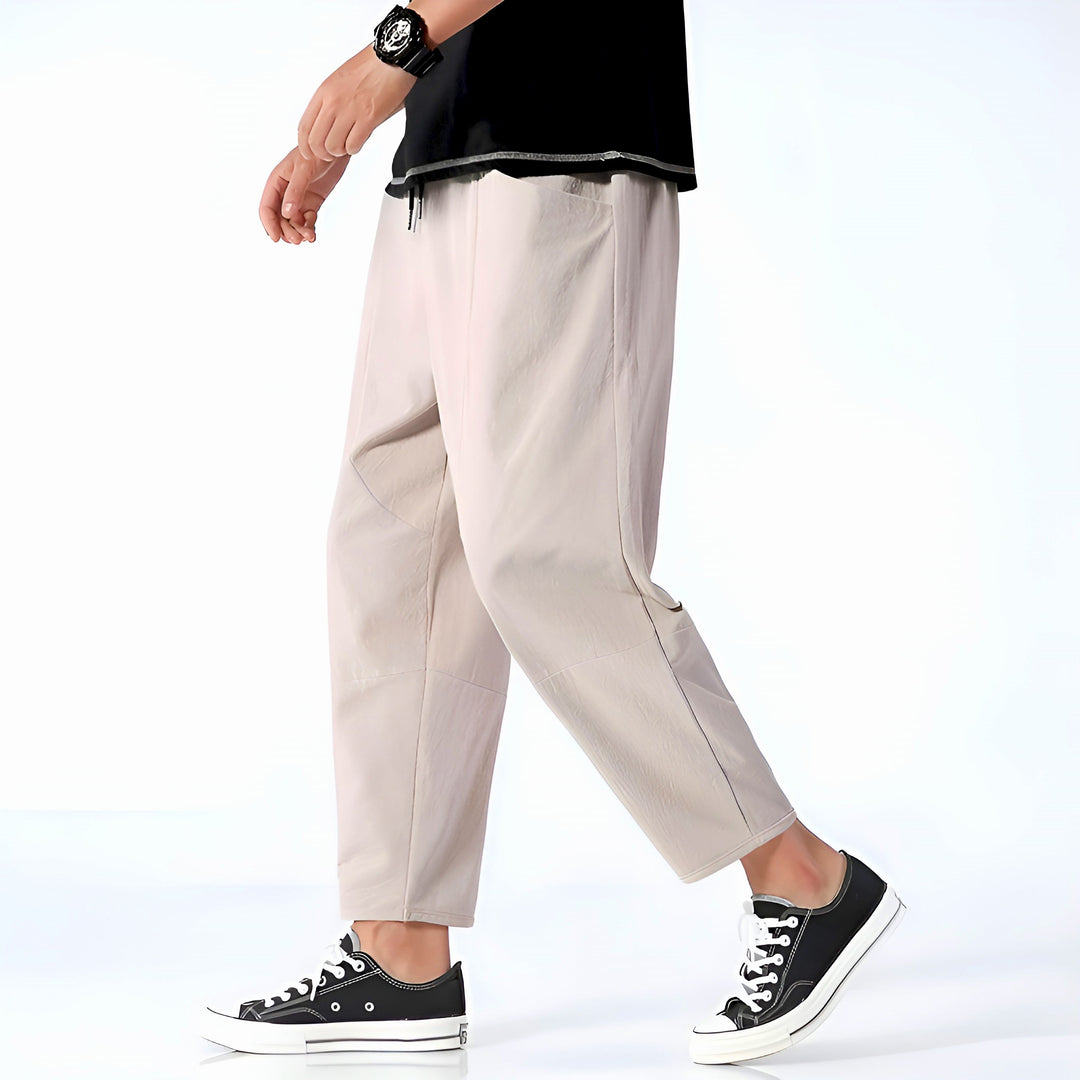 Lightweight men's summer cropped drawstring pants, offering breathability and style.