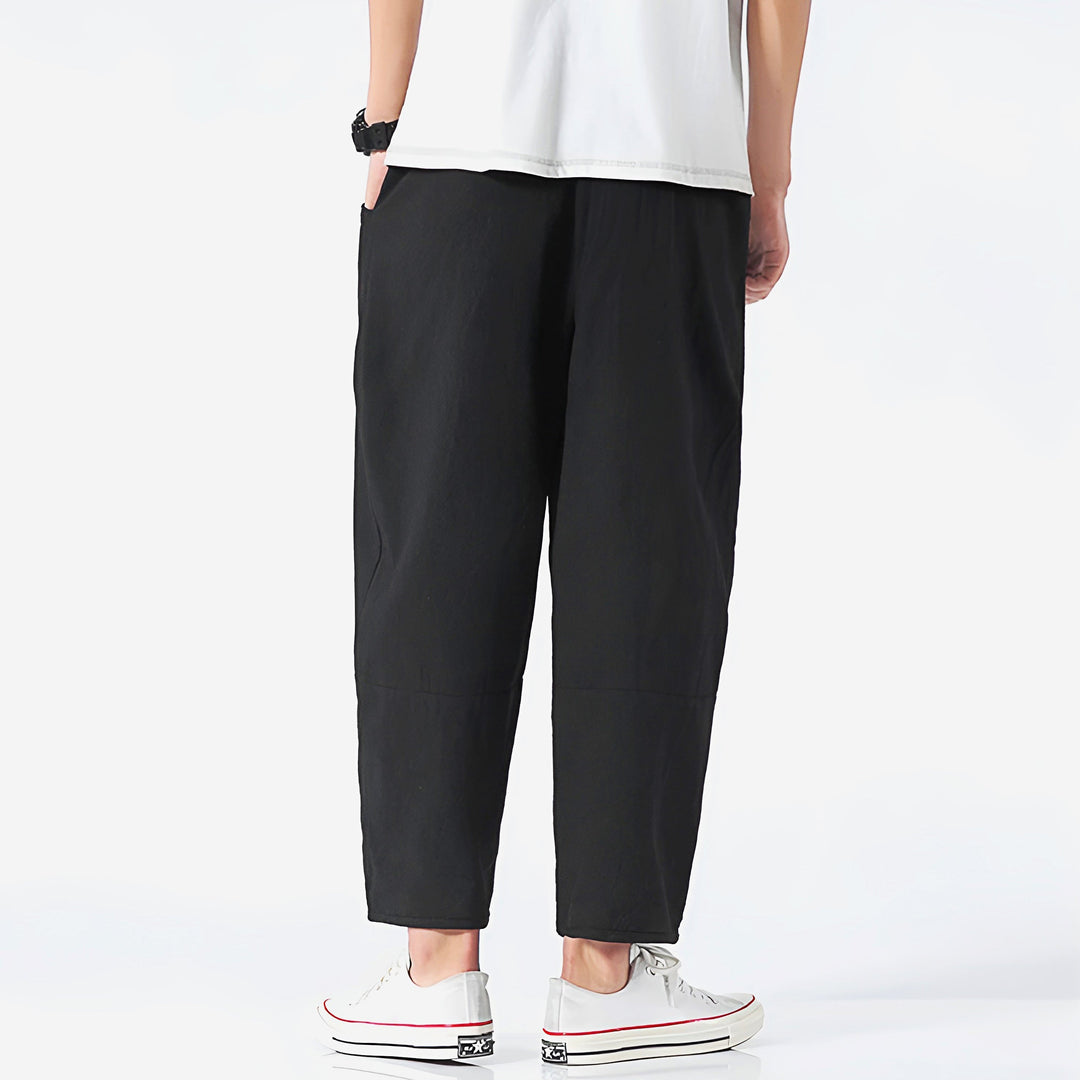 Full view of men's cropped drawstring pants, epitomizing casual effortless style.