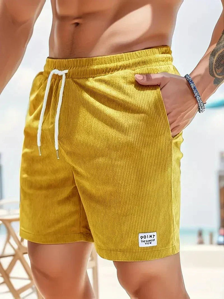 Comfortable men's casual shorts, elastic waist, and drawstring, ideal for relaxed everyday apparel.
