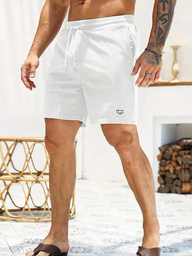 Relaxed fit men's casual shorts, comfortable with a drawstring and elastic waist for warm days.