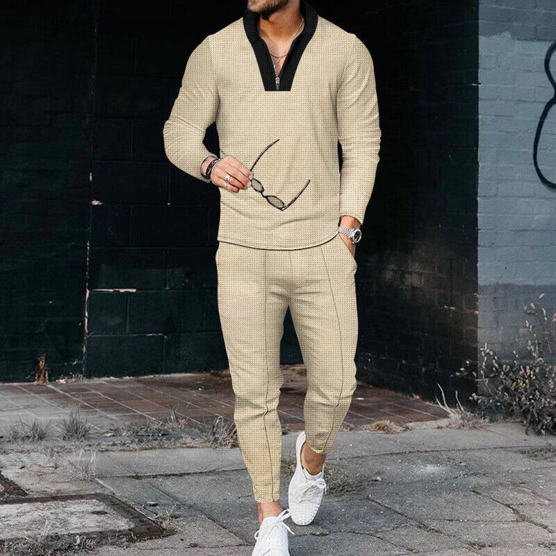 Men's casual khaki two-piece outfit featuring a zip-up top and comfortable trousers, ideal for modern leisurewear.