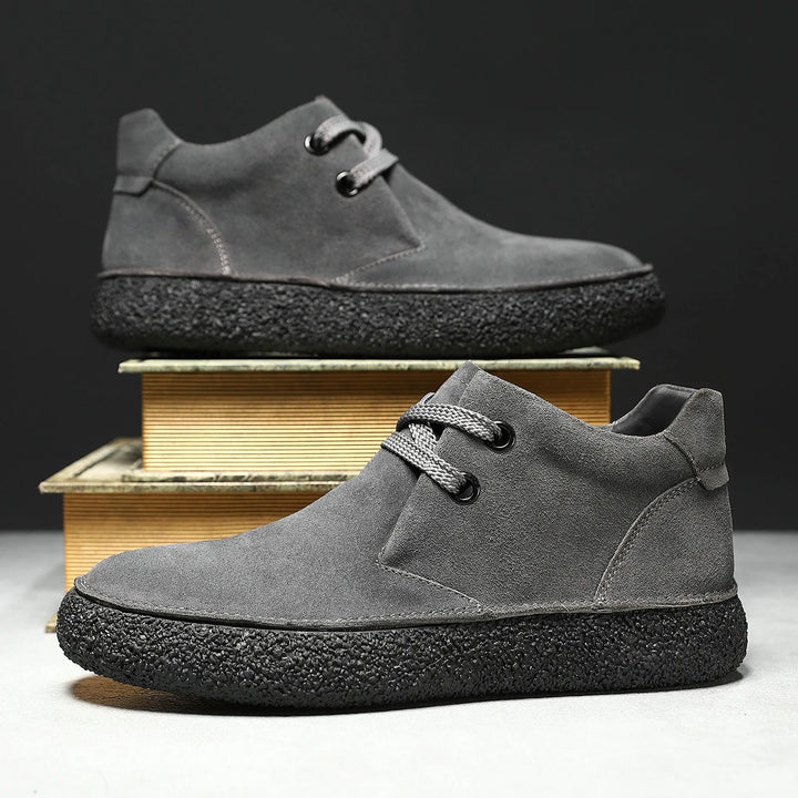 Pair of stylish men's lace-up suede shoes in navy, perfect for comfortable everyday footwear