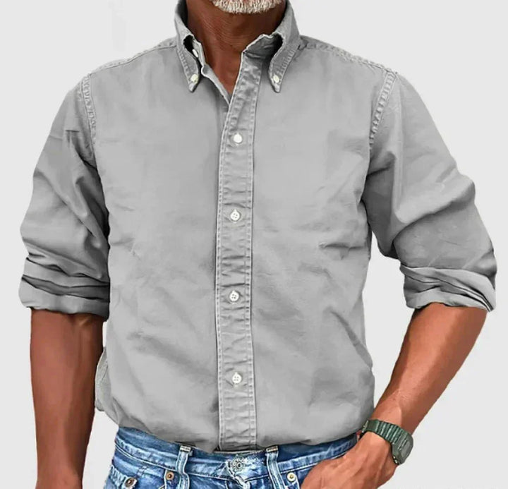 Men's casual long sleeve button-up shirt in a vibrant blue hue, suitable for various occasions