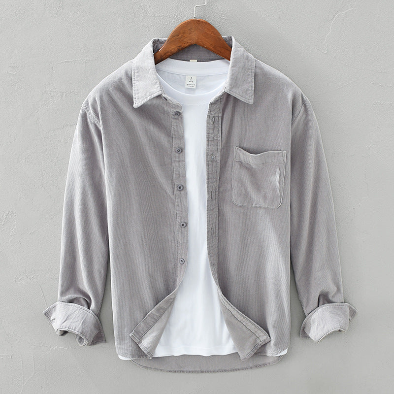 Versatile men's casual long sleeve shirt featuring a button-up front and practical chest pocket.
