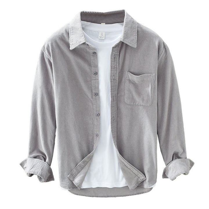 Transitional men's casual shirt; long sleeve button-up top with a chest pocket for stylish layering.