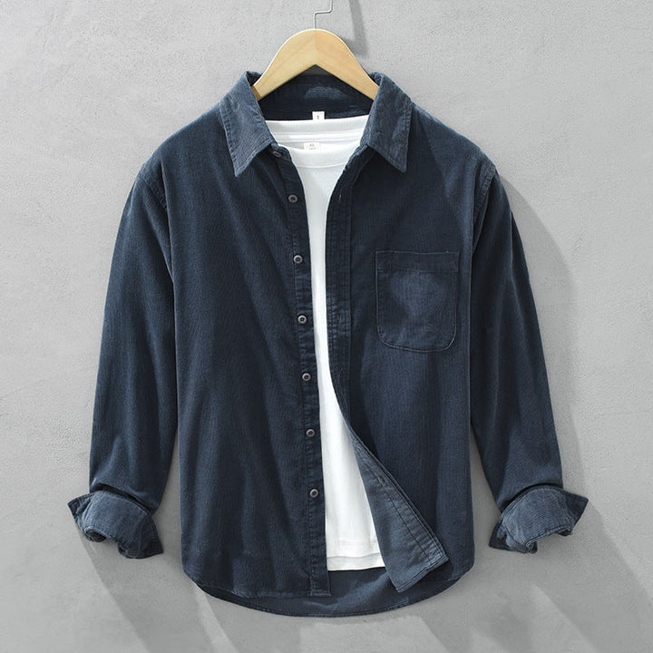 Modern men's casual button-up shirt in a stylish fabric, offering a comfortable long sleeve fit.