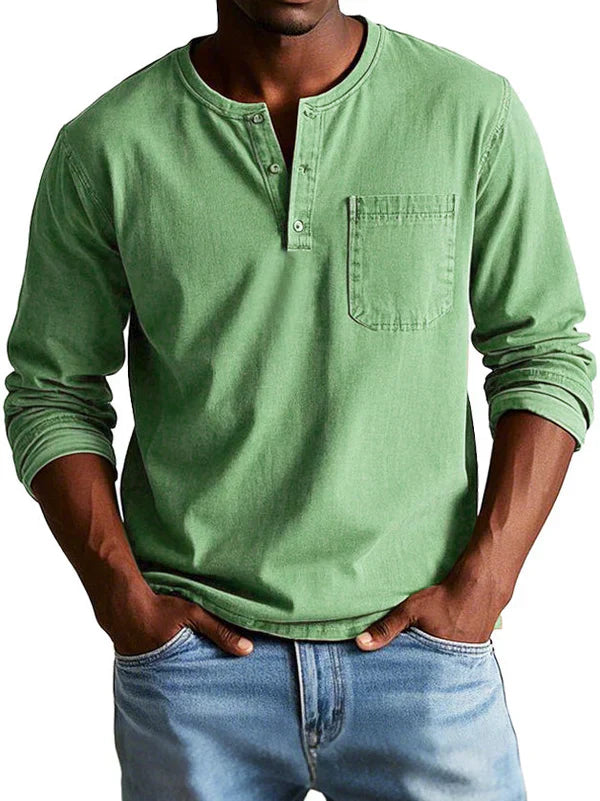 Close-up of the button placket on a men's casual long sleeve henley shirt, soft fabric feel