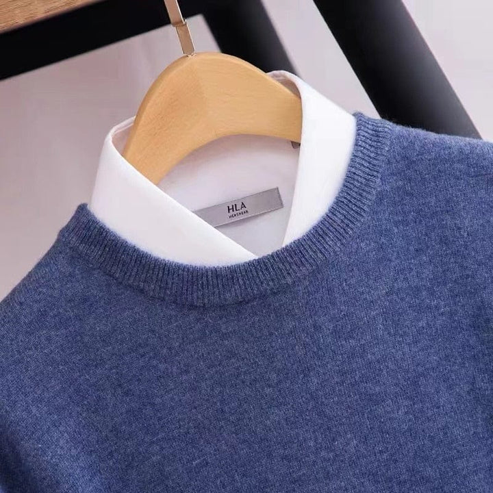 Comfortable men's knitwear: a versatile long sleeve crewneck sweater in a classic solid color.