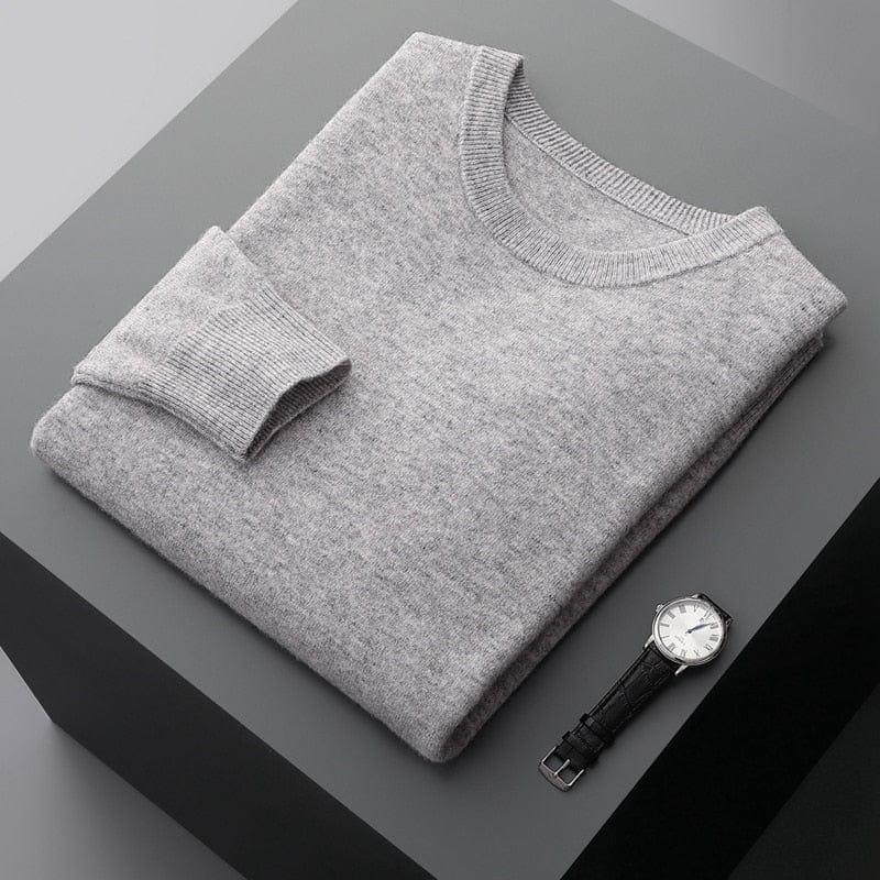 Versatile men's sweater: view of a folded long sleeve knit crewneck, ready for a winter outfit.