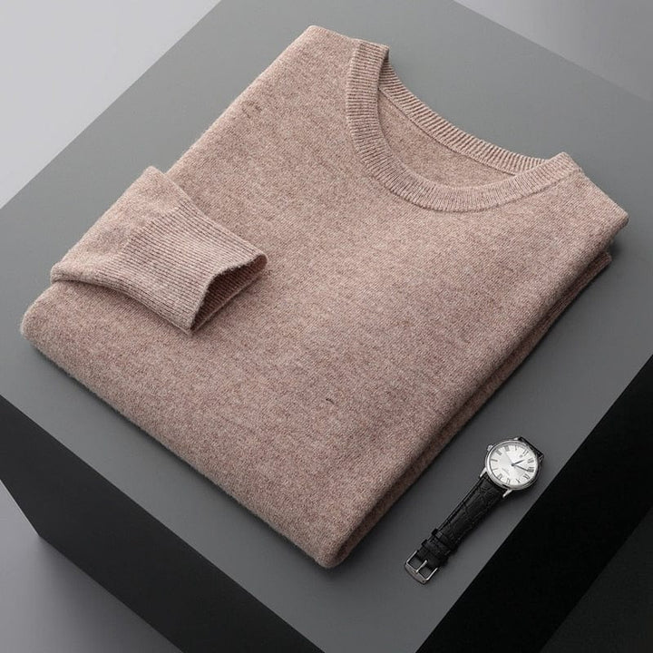 Front view of a men's crewneck knitwear sweater, highlighting its simple elegance and long sleeve design.