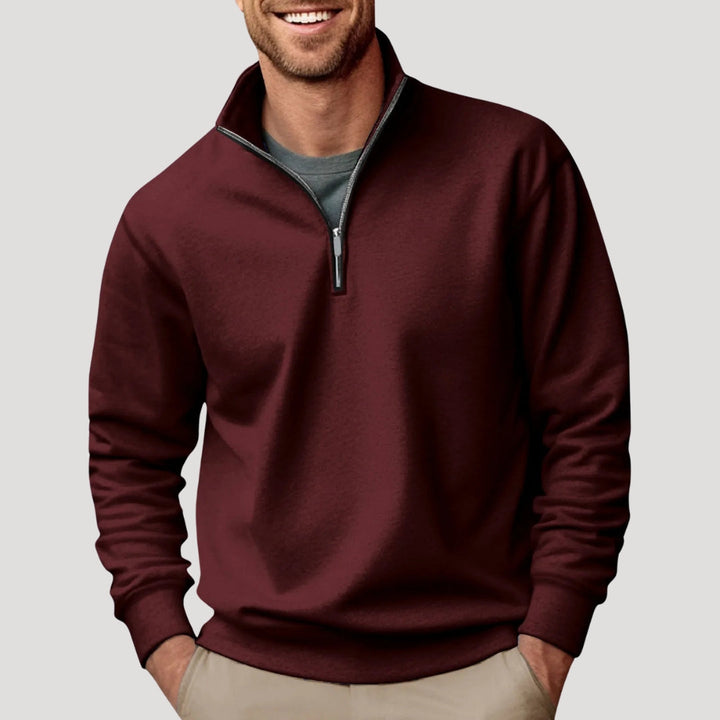 Men's comfortable quarter zip sweatshirt in charcoal, a key piece for fall and winter wear.