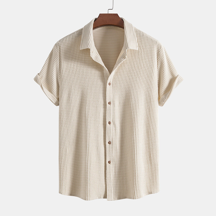 Comfortable men's loungewear set: short sleeve shirt & drawstring shorts. Relaxed fit for casual summer wear.