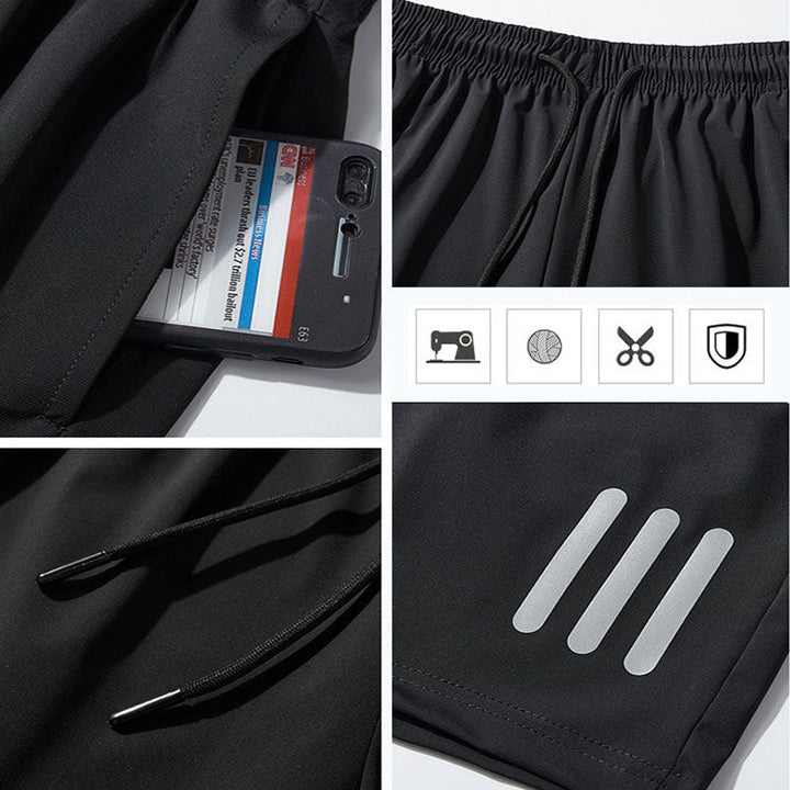 Folded pair of men's summer athletic shorts, ready for vacation or gym, with prominent drawstring.