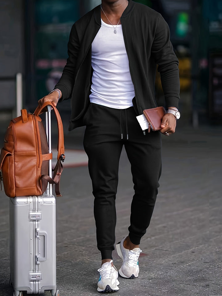 Men's casual travel tracksuit: black zipper jacket, matching joggers, perfect for athletic wear or loungewear.
