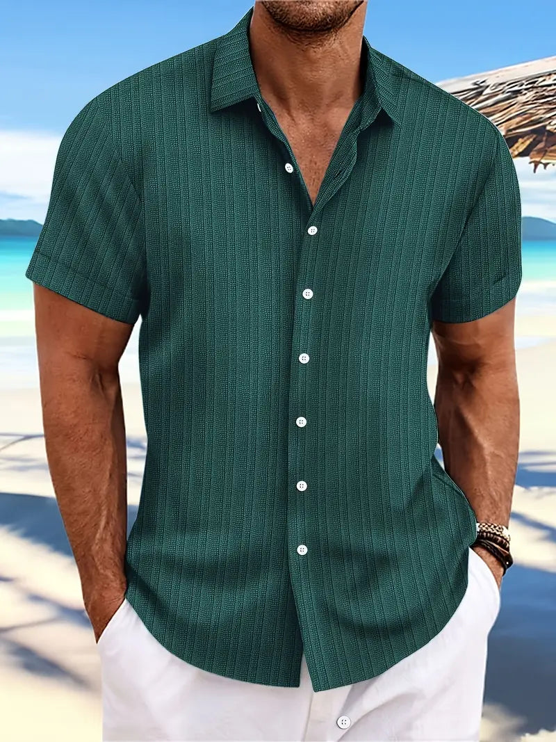 Stylish men's green short-sleeve button-down shirt, great for casual summer outings and comfort.