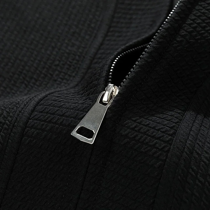 Relaxed fit men's zip-up sweater for stylish fall & winter fashion, a comfortable layering piece.