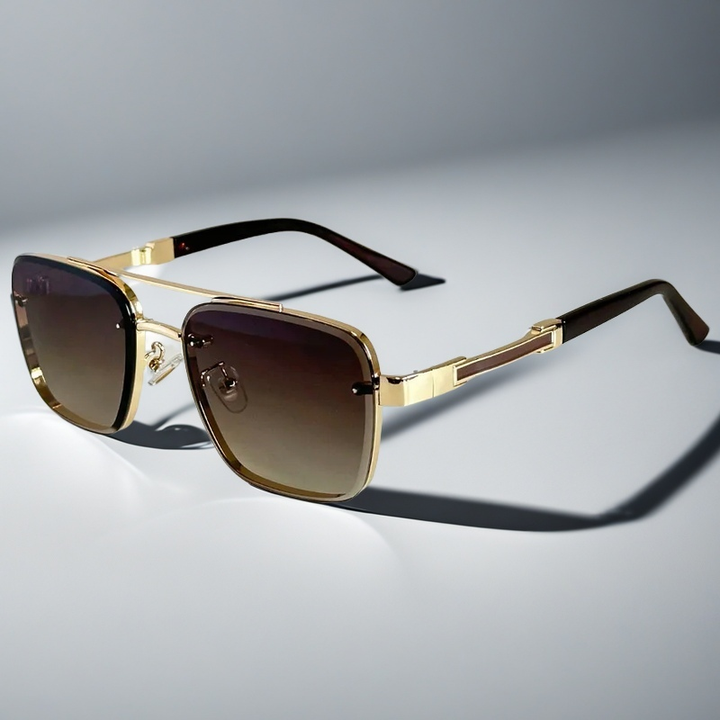 Men's classic aviator sunglasses with gold frame and stylish gradient lenses for UV protection.