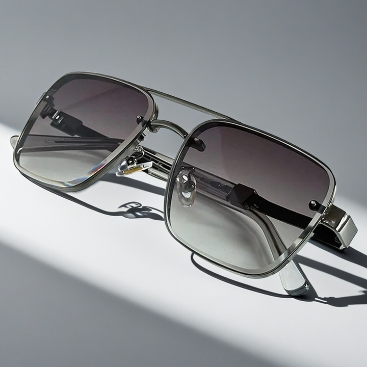Sleek men's aviator sunglasses, gold frame, gradient lenses, offering classic style and UV protection.