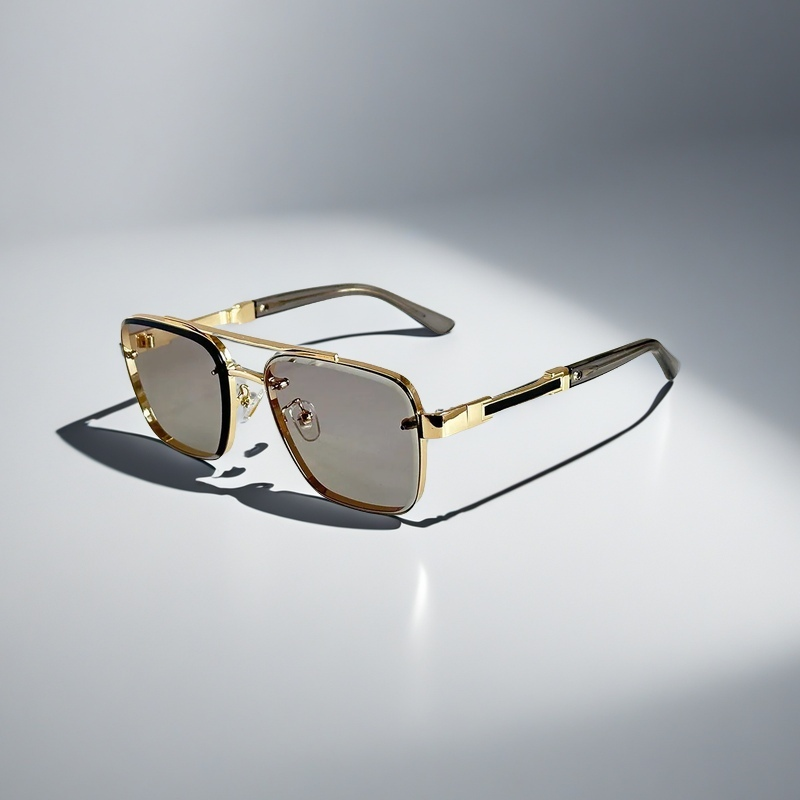 Aviator sunglasses for men with protective gradient lenses, sleek gold frame, classic style eyewear.