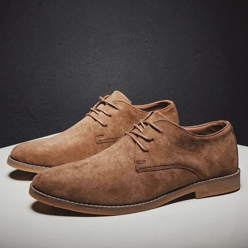 Timeless men's leather Oxford dress shoes. Sleek design, ideal formal footwear for sophisticated business fashion.