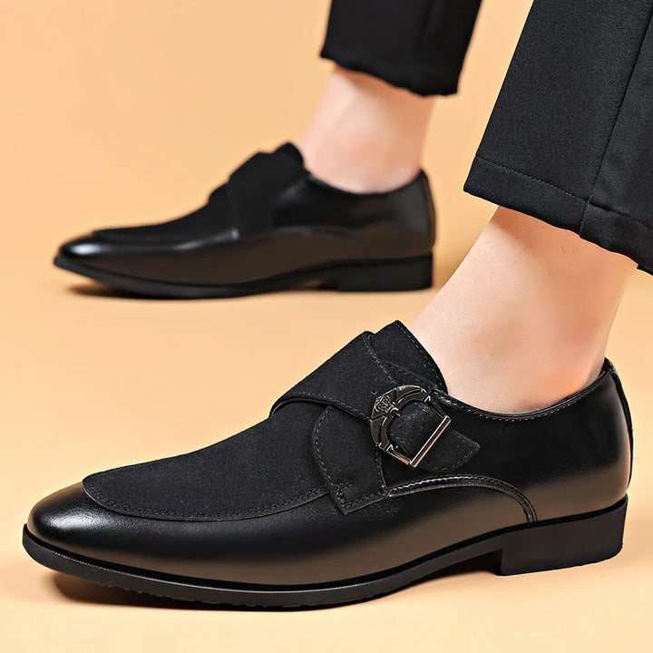 Men's fashion: dark brown suede loafers with a distinctive buckle, ideal for a refined smart casual look.