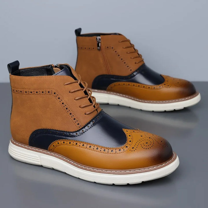 Men's leather dress boots with elegant brogue accents, a staple for any wardrobe.
