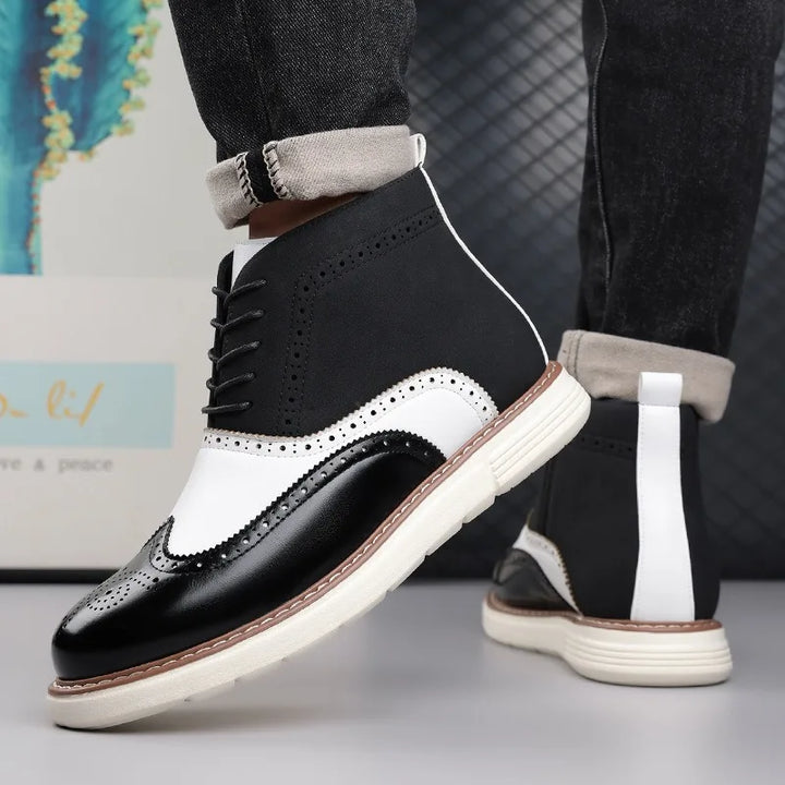 High-angle view of men's classic brogue boots, showing the entire footwear design.