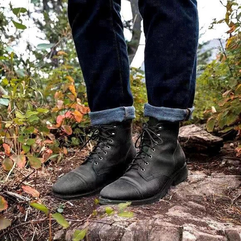 Rugged men's lace-up ankle boots, classic brown leather for durable everyday wear. Stylish and versatile footwear.