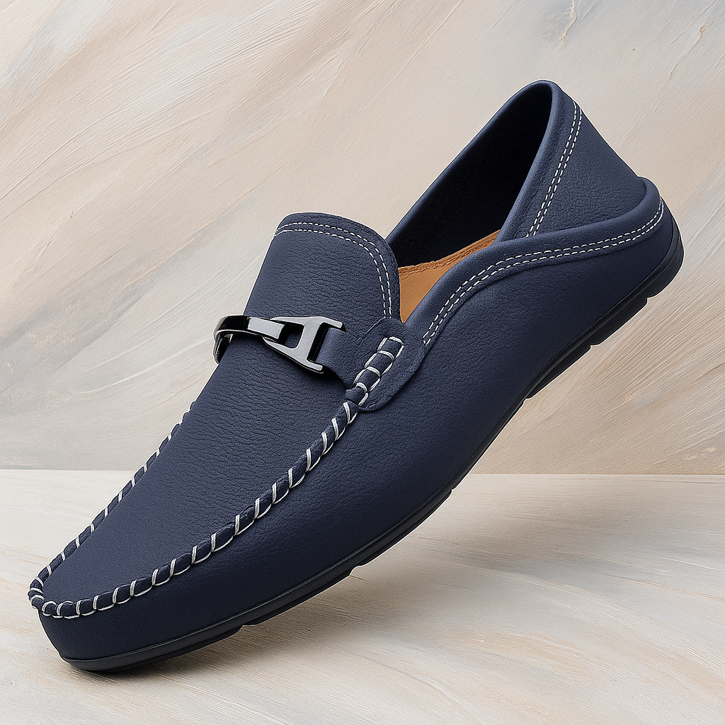 Close-up of a men's bit loafer showing the detailed metal bit and smooth leather texture.
